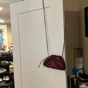 Bottega Veneta mini pouch clutch in burgundy